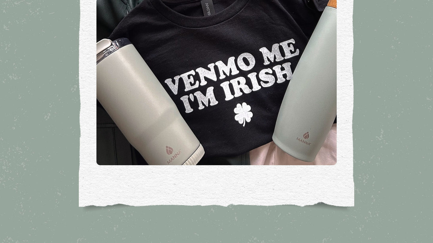 Two green water bottles next to a "Venmo me I'm Irish shirt."